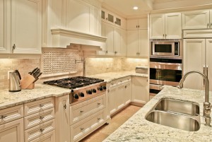 Modern luxury  kitchen with white cabinets and marble countertops