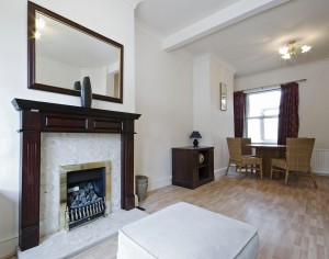 classic style living room with fireplace and decorative elements